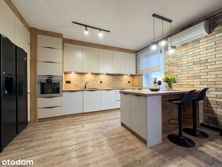 76,48 m² | 4 pokoje | Dwa duże balkony | Klimatyzacja | Winda I Garaż