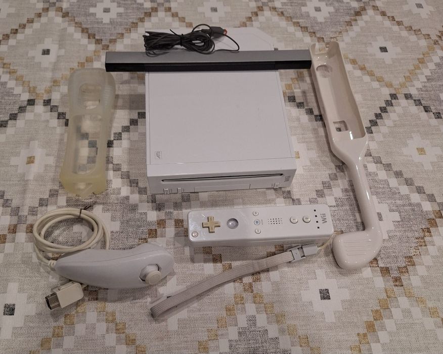 Nintendo Wii com 52 jogos digitais.