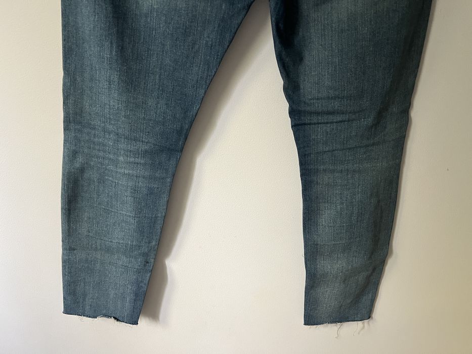 Jeansowe spodnie z postrzępieniami slim fit Top Secret roz. 42 / XL