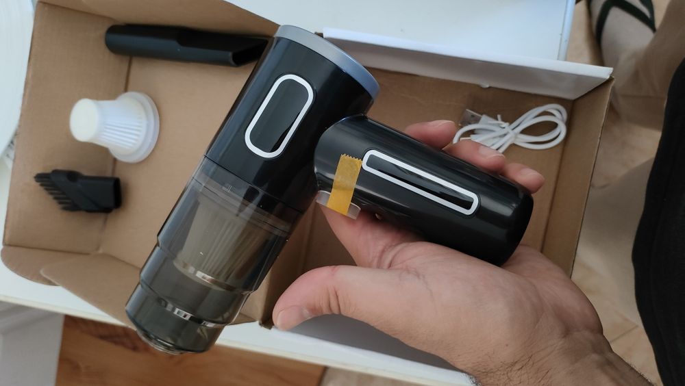 Mini aspirador portátil