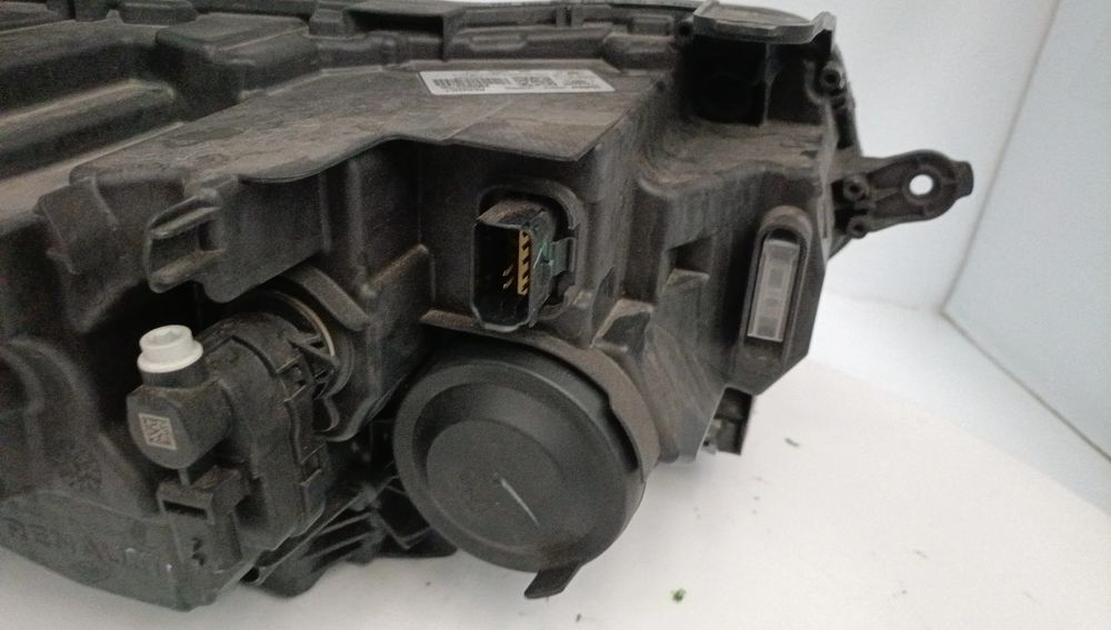 Ótica / farol esquerda DACIA Duster (HM_)