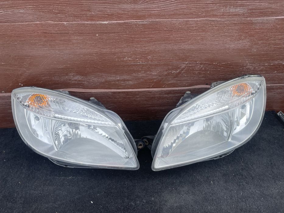 Фари, фара, ліхтарі передні Skoda Fabia 2 Roomster Шкода Фабія 2