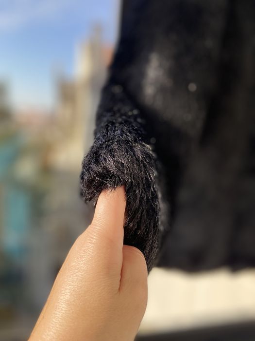 Casaco de pelo preto elegante