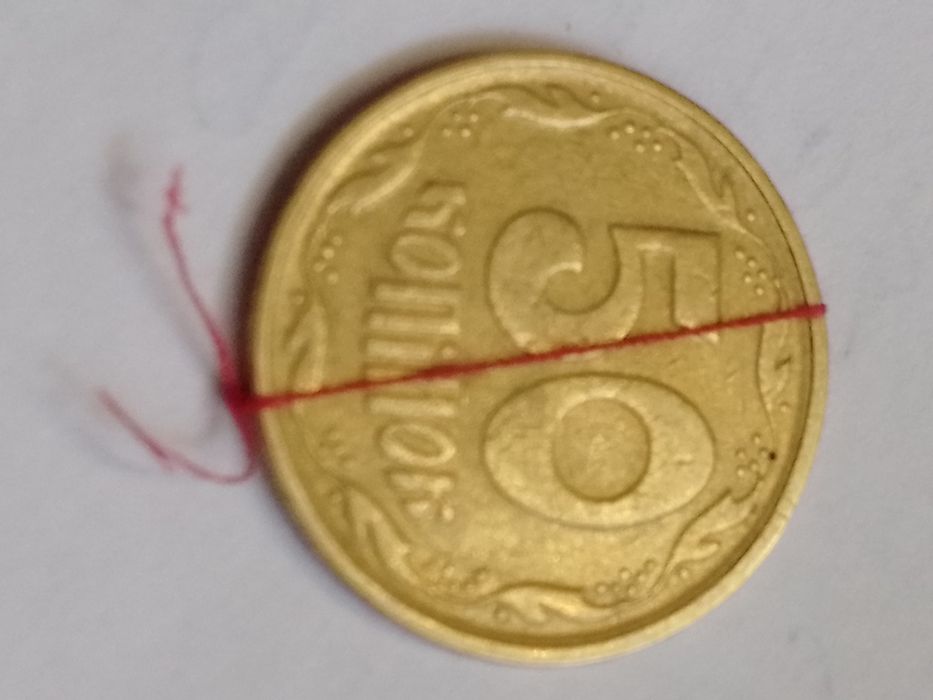 Брак монет України