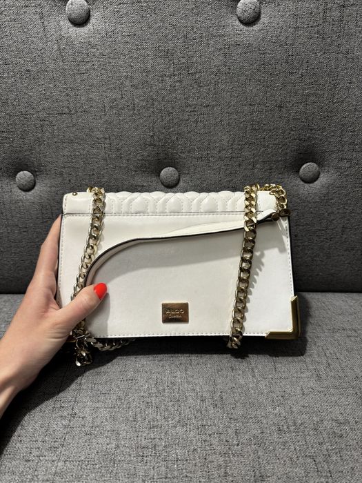 Біла сумочка aldo зі змією