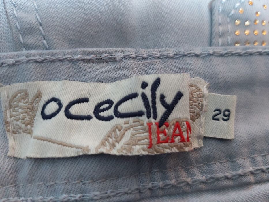 Jeansy damskie białe