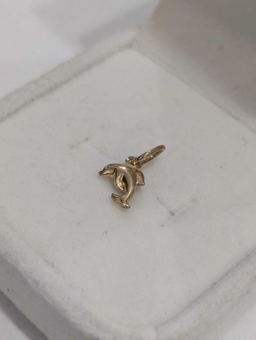 Złota zawieszka delfin 333 8K 0,27 g dł. 12 mm