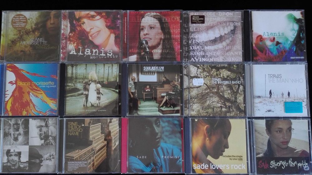 CDs Bryan Adams, Sade, Marron 5, David Bowie e outros