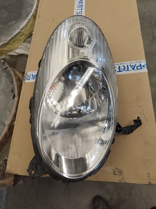 Farol frente esquerdo Nissan micra