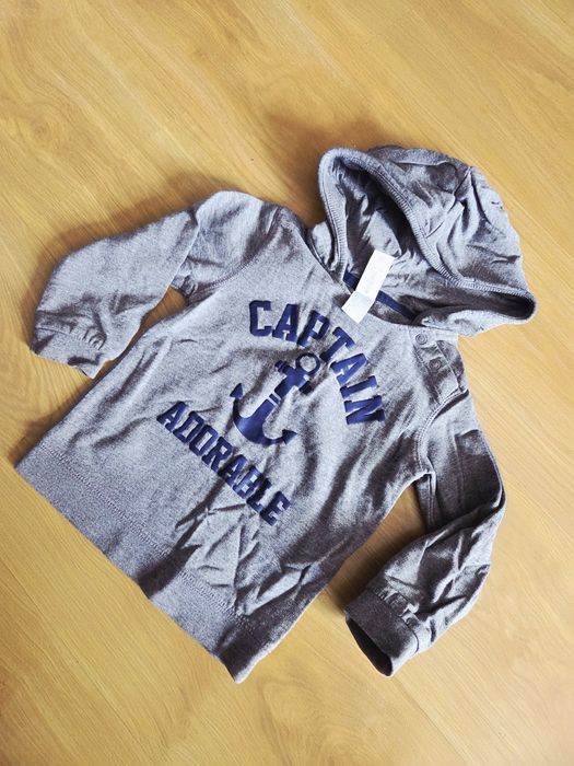 Paka ubrań w rozmiarze 92
Bluza i sweter z dinozaurami Next.
Dres z P