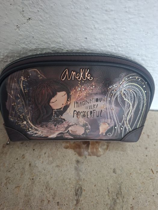 Pochete nova original Anekke