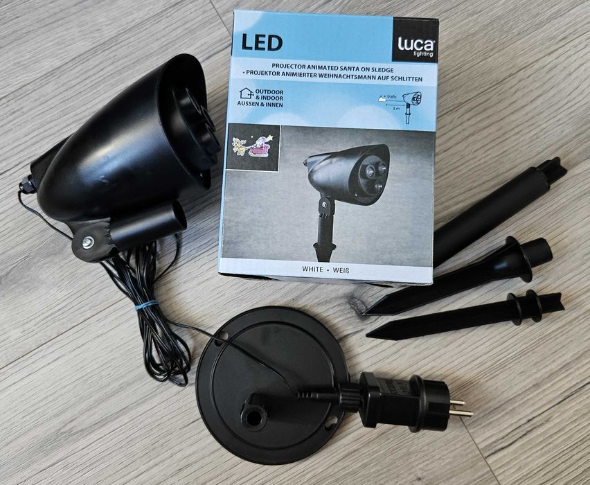 Projektor rzutnik LED animowany Święty Mikołaj na sankach