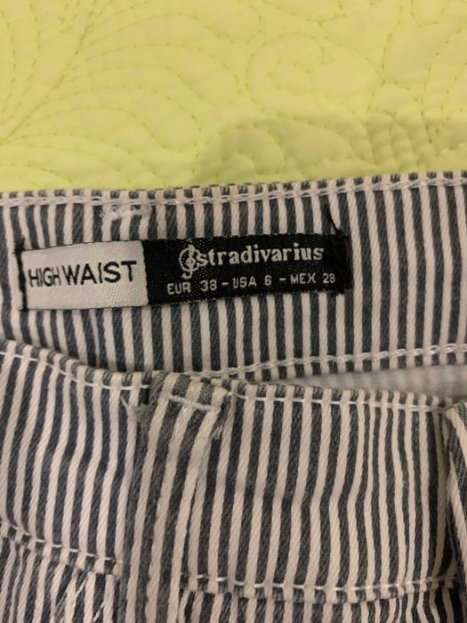 Calças riscas Stradivarius