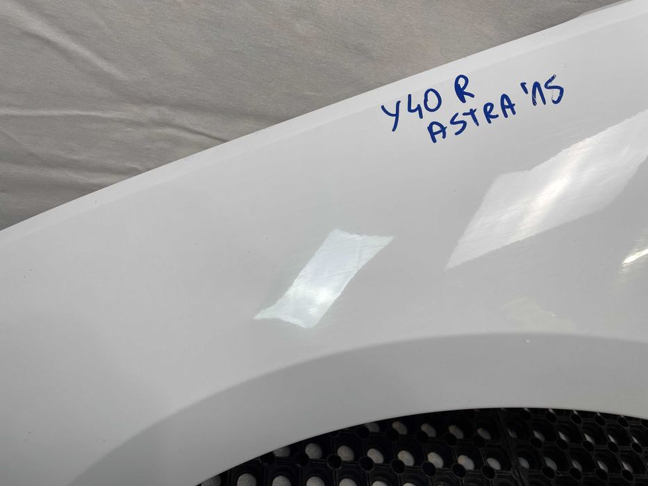 Błotnik przód przedni lewy opel astra v k kod lakieru: y40r 2015-