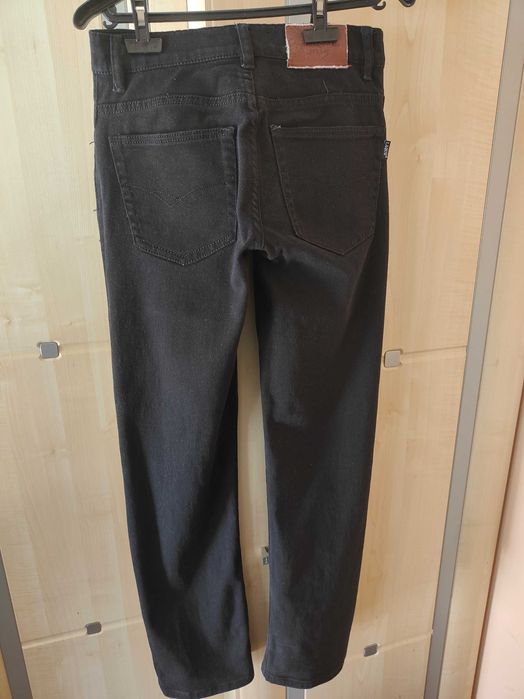 Spodnie  jeans męskie młodzieżowe rozmiar S/M  stan bardzo dobry