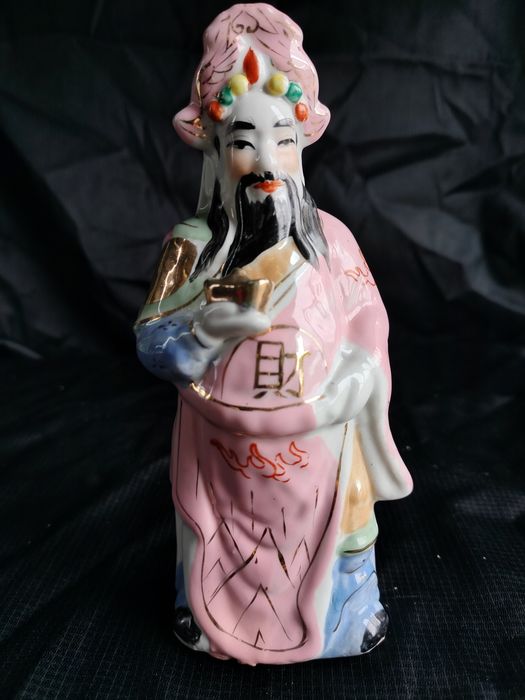 Stara ceramiczna figurka