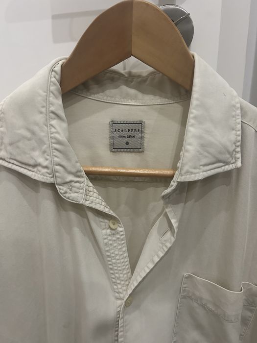 Camisa Scalpers como nova