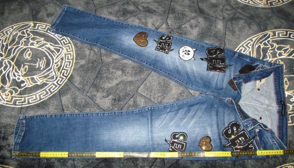 Темно-сині джинси