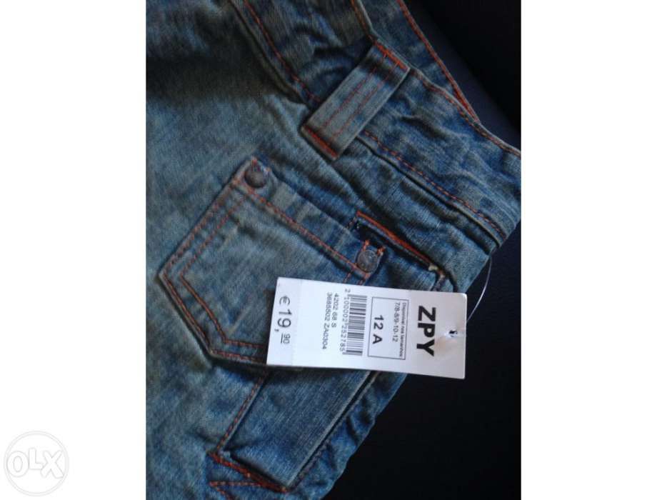 Calças de ganga novas com etiqueta - 12 anos