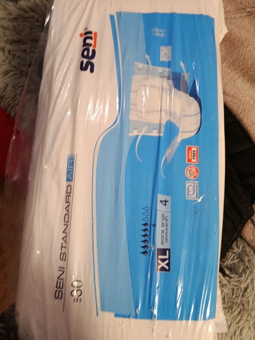 Продам памперсы XL.