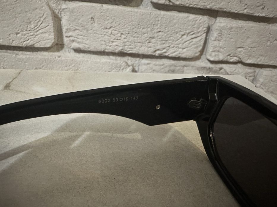 Okulary Prada czarne damskie męskie musthave glamour bestseller