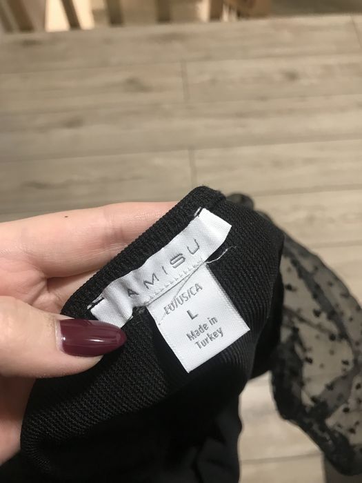 Чорний топ з об‘ємними рукавчиками