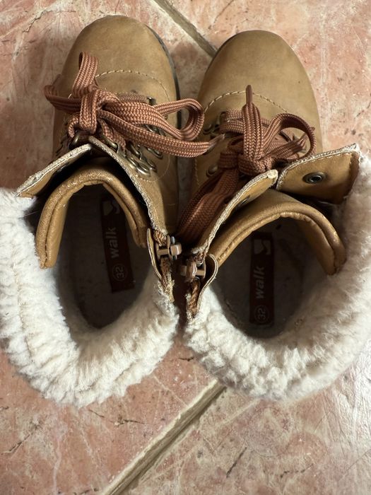 Botas em pelo no interior