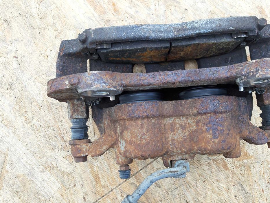 Zacisk Chrysler Grand Voyager 11-21r Dodge Caravan RT RH