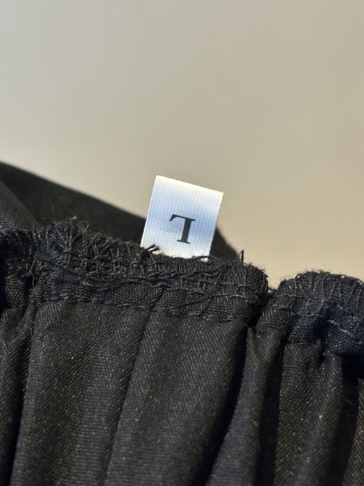 Materialowe spodnie z kieszeniami