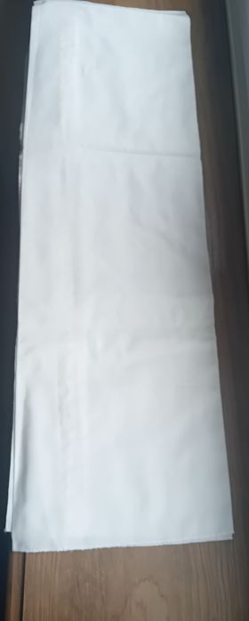 Lençol de alcofa novo e 1babete usada