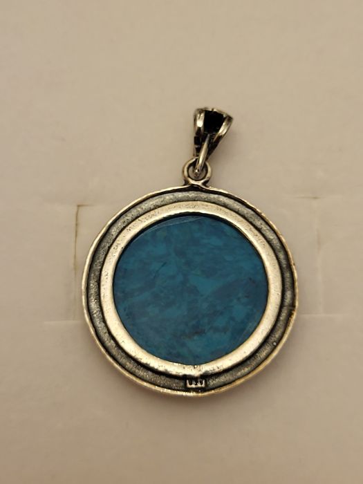 Srebrna przywieszka z markazytami i turkusem