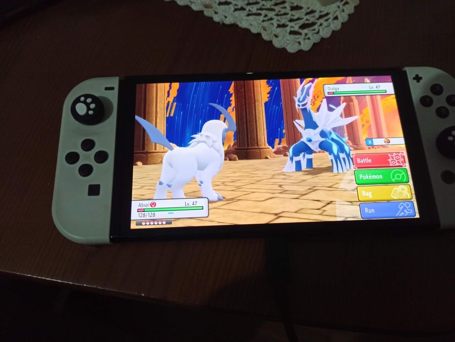 Nintendo Switch OLED + Pokémon Diamond + Bolsa | Seguro 2027
