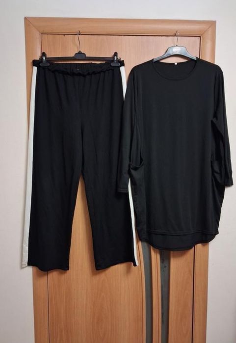 Модні стильні костюми, розмір 16-22