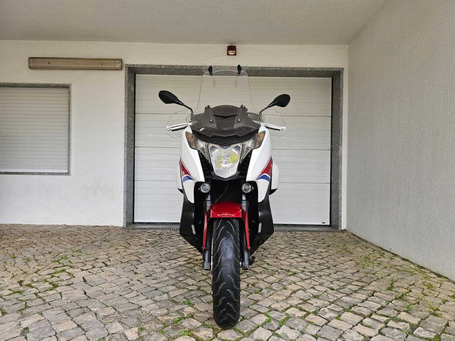 Honda Integra 750 Sport DCT Tricolor malas laterias top case de 56 litros punhos aquecidos com Garantia