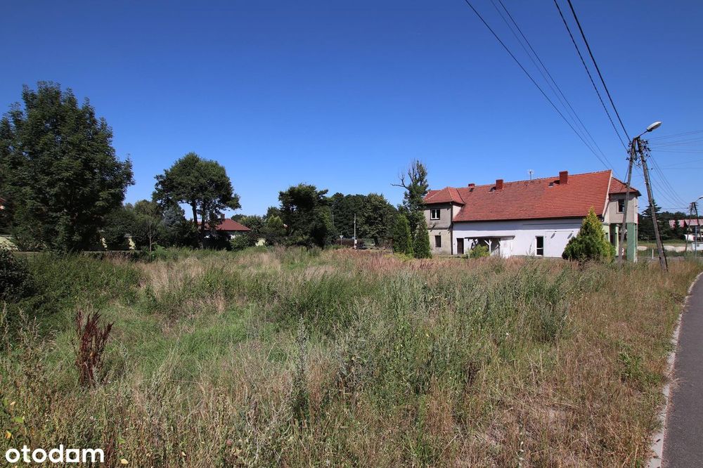 Duża działka z budynkiem handlowo - usługowym przy drodze wojewódzkiej