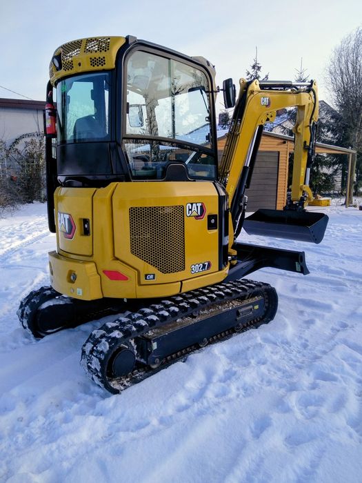 Minikoparka caterpillar 302.7 + wiertnica