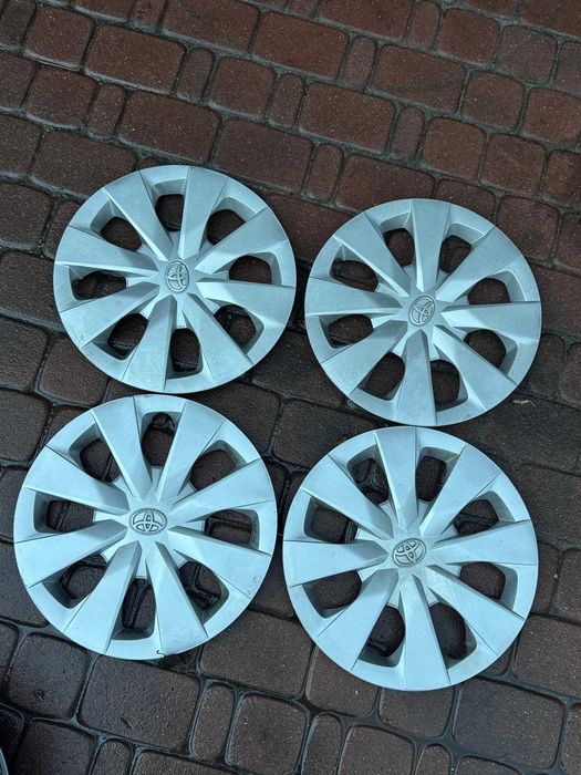 '15 Kołpaki komplet oryginalne Toyota Yaris Auris Aygo Avensis Proace