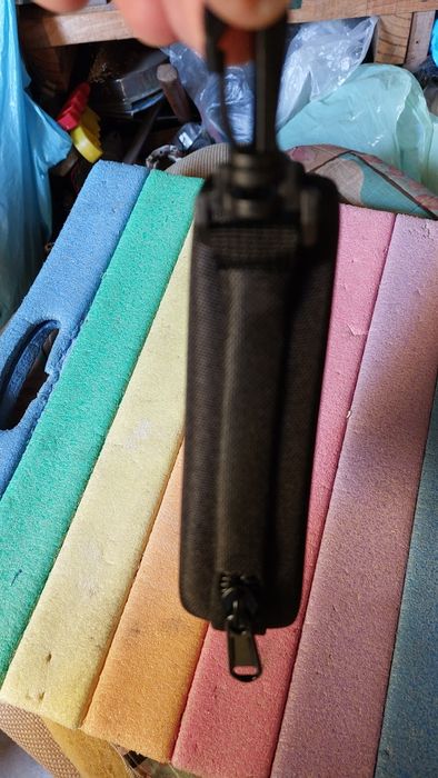 Estojo com 16 medalhas de pesca