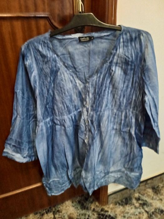 Roupa TAM XL em bom estado