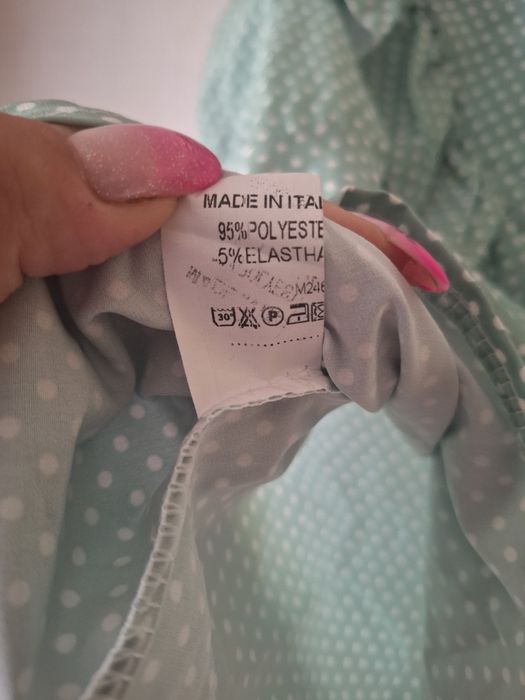 Bluzka miętowa w groszki z falbanką