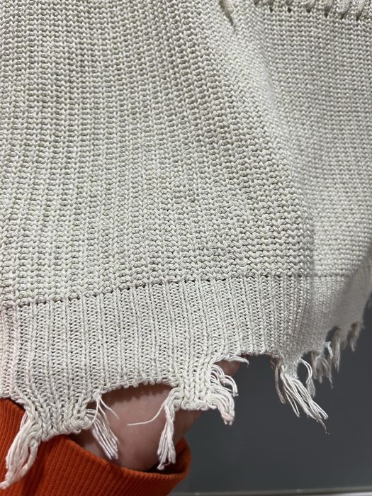 Вʼязані кофти молочного кольору