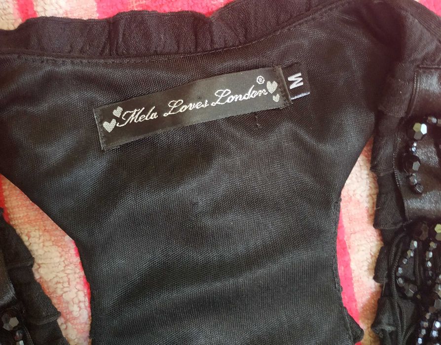 Czarna elegancka krótka sukienka , rozmiar M.