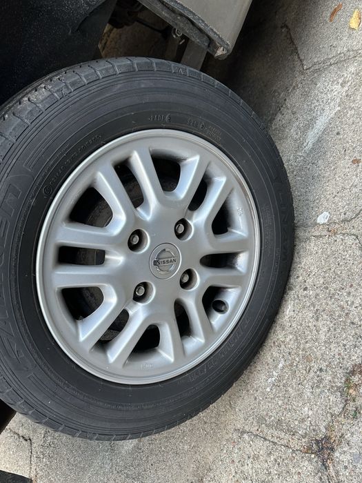 Koła kompletne R14 Nissan 175/70 R14 Alufelgi Oryginalne Stan Bdb