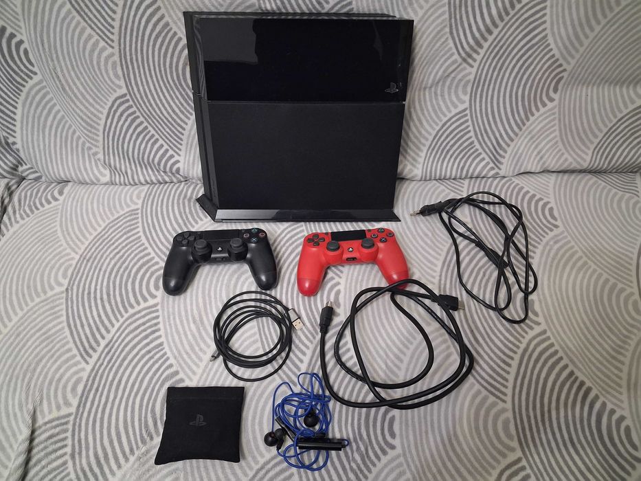 Zestaw Konsola Ps4 500 GB wraz z podstawką, grami i filmami