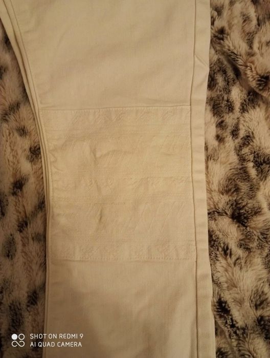 Białe jeansy Zara 36
