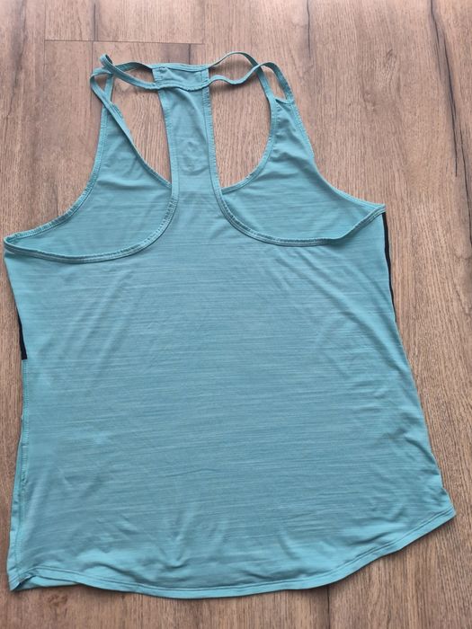 Bokserka koszulka treningowa Reebok M
Kolor miętowy
Normalne ślady uży