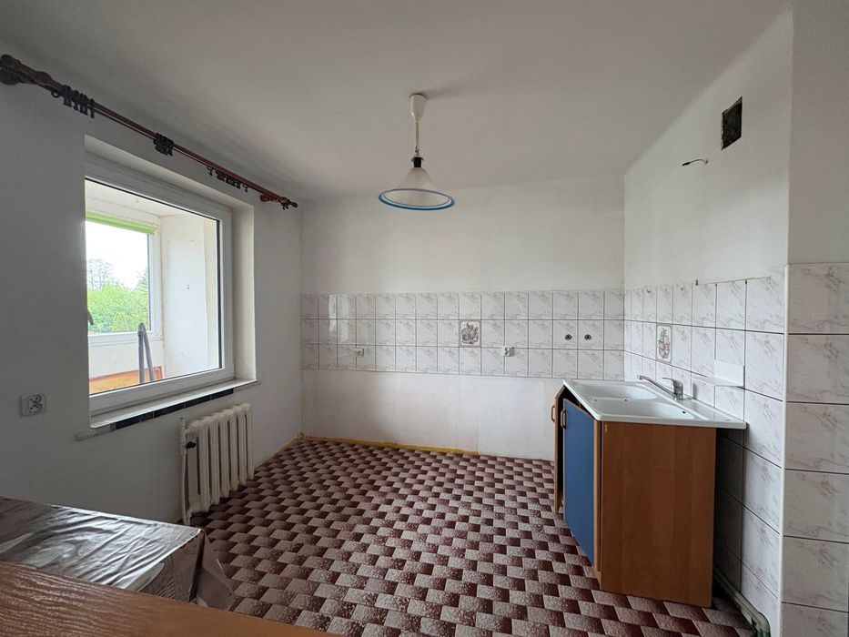 Sprzedam przestronne mieszkanie 64,8 m² – parter, 3 pokoje
