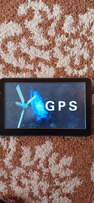 GPS навігатор + мультимедіа + FM модулятор