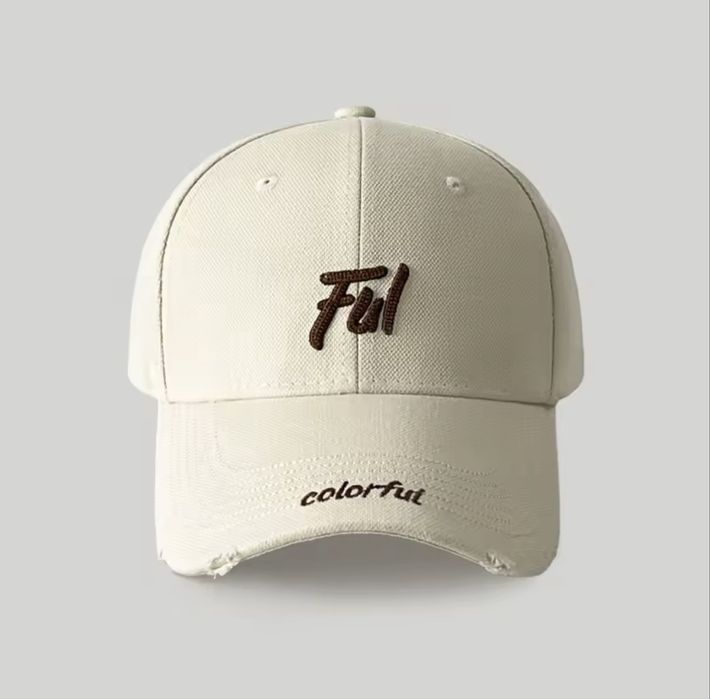 Кепка жіноча, з вишивкою і потертостями