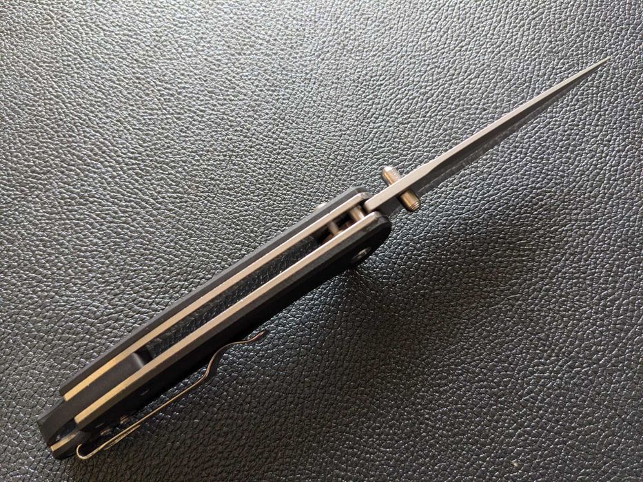 Ніж складний. сталь D2. кнопочний  інерційний ніж